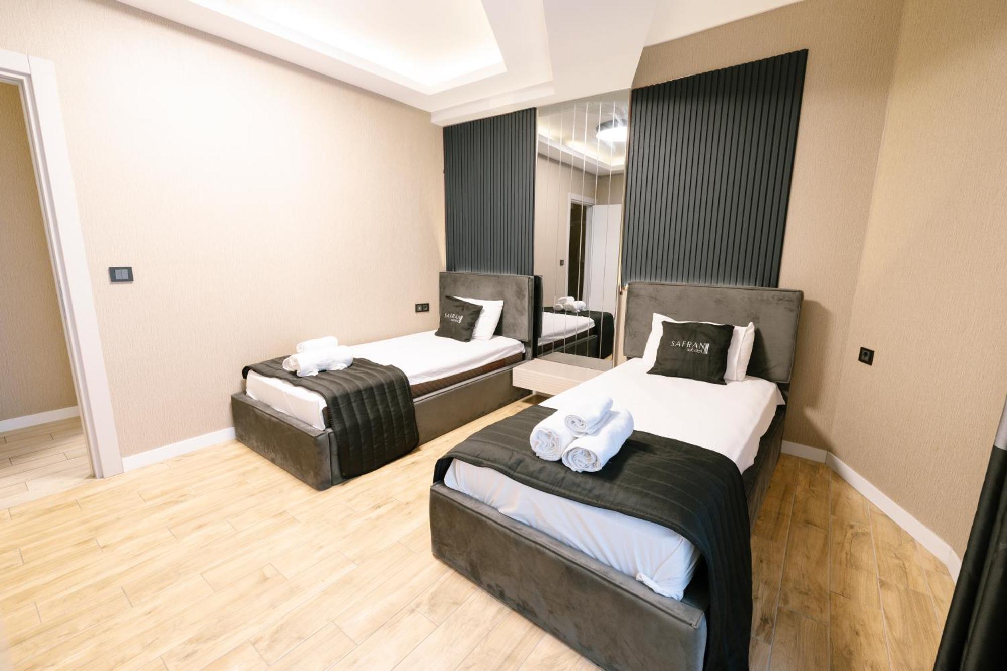 Safran Suit Otel Buca Bagian luar foto